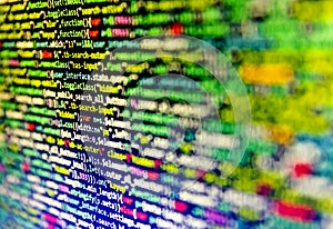 Abstract software developer programming code. Screen of web developing php code on dark background. Binary computer code