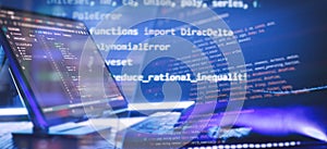 Abstract software development concept with code and laptop on blurred background representing programming, coding and