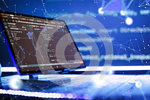 Abstract software development concept with code and laptop on blurred background representing programming, coding and