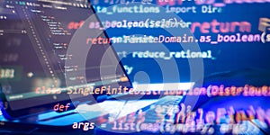 Abstract software development concept with code and laptop on blurred background representing programming, coding and