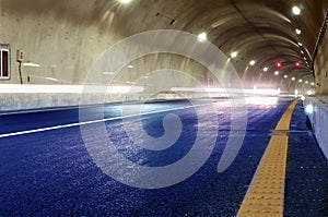 Abstract speed motion in urban highway road tunnel