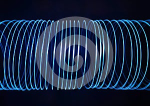 Abstract spiral light spring. Freeze-light neon blue tunnel.