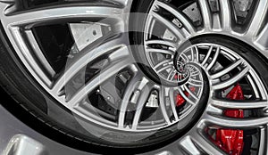 Abstract sport car spiral wheel rim with tire, brake disc. Automobile repetitive pattern background illustration. Car wheel and ti photo