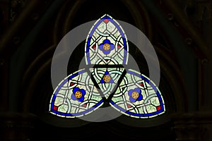 Abstract stained glass window in the chapel of Chaalis abbey photo