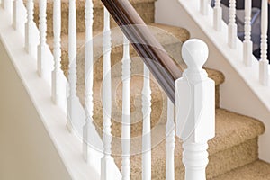 Abstract of Stair Railing and Carpeted Steps in House