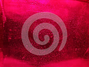 Abstract stone texture red color with waterdrops. Background for design purpose