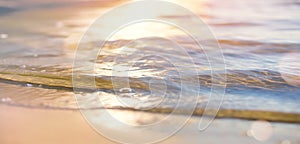 Abstract summer vacation background. Bokeh sunset light on summer sea beach