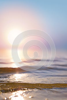 Abstract summer vacation background. Bokeh sunset light on summer sea beach