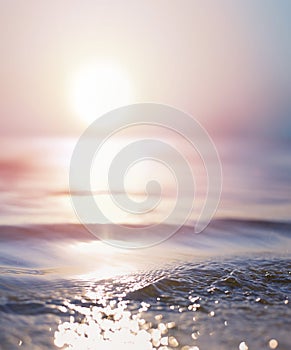 Abstract summer vacation background. Bokeh sunset light on summer sea beach