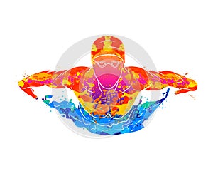 Abstract of a swimmer butterfly from splash of watercolors photo