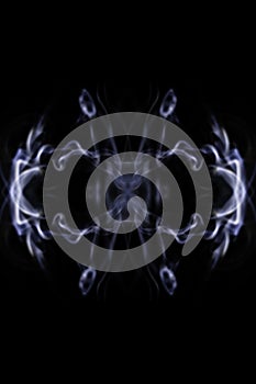 Abstract symetrical shaped smoke against black background