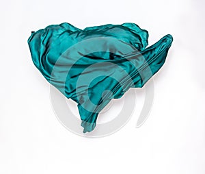 Abstract teal fabric in motion