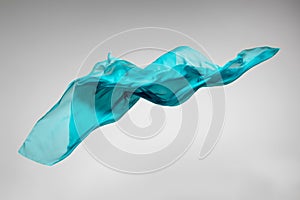 Abstract teal fabric in motion