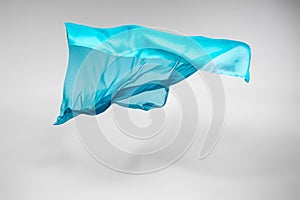 Abstract teal fabric in motion