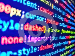 Abstract technology background. Developer working on program codes in office. Shallow depth of field, selective focus effect.