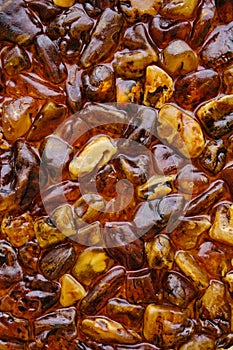 Abstract texture and background of amber stone.