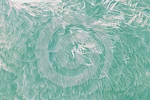 Abstract texture background from ostrich feather. Tonned biscay green photo