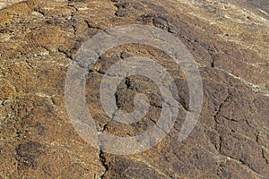 Abstract texture of dried cracked scorched earth. Global warming and shortage of water on the planet concept. Solidified grey