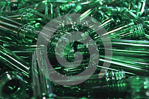 An abstract texture of green pet plastic preforms