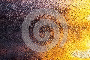 Abstract texture of multiple water drops on glass