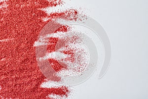 Abstract texture. A red glitter background