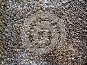 Abstract texture of solid rough granite slab with grooves. Abstract granite background.