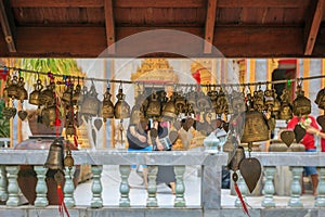 Abstract Thai golden bells in the temple.