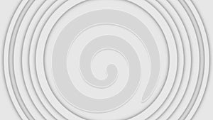 Abstract three-dimensional circles move on white background. Animation. Bulk layer spiral circles pulsate increasing in photo