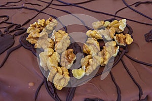 Abstract tort decoration with walnuts like a heart