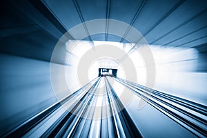 Abstract train moving in tunnel