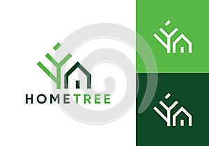 abstract tree with home logo design vector