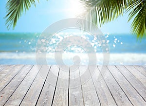Abstract Tropical Sea beach background with white wood panel in the foreground
