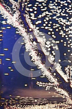 Abstract underwater games with bubbles and light