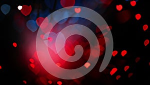 Abstract Valentine's day heart shaped bokeh background in red and blue tones