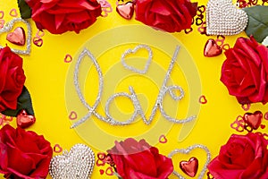 Abstract Valentine's Day yellow background with red roses, love word and hearts