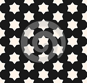 Abstract vector geometric seamless pattern with white stars on black backdrop