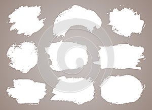 Abstract vector paint set. Isolated grunge elements for paper design. Ink paint brush stains or spots on light