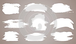 Abstract vector paint set. Isolated grunge elements for paper design. Ink paint brush stains or spots on light