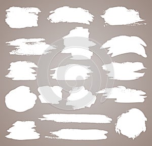 Abstract vector paint set. Isolated grunge elements for paper design. Ink paint brush stains or spots on light