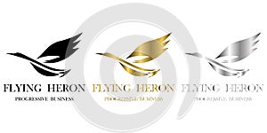 Vector three color black gold silver image of a flying heron is suitable for making logos or decorations photo