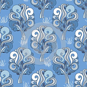 Abstract vector winter forest in blue tones. Seamless floral pattern of trees, branches with curls and wavy lines