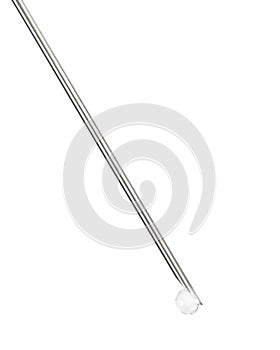 Abstract vertical medical syringe needle injection drip, isolated drop, large detailed vertical macro closeup studio shot