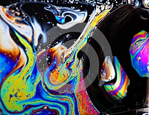 Abstract vibrant colorful background and soap bubbles