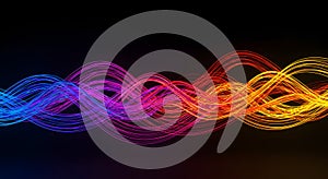 Abstract Vibrant Light Waves in Red, Blue, and Yellow on Dark Background