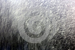 Abstract View from Inside a Car Being Washed - Water, Soap, etc. on the Windshield