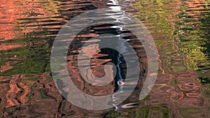 An abstract view of the rippled reflection of wangi waterfalls in litchfield national park