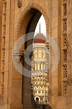 An abstract view of The Taj Mahal Palace hotel through the arch of Gate Way of India