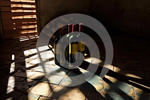 abstract view of wine bottle shadows on cellar floor