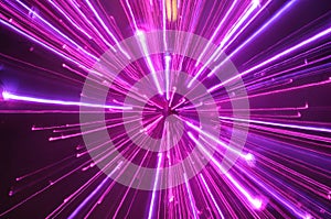 Abstract violet light streak blurs photo