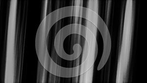 Abstract visualization of monochrome stage lights, seamless loop. Motion. White glowing spotlights on a black background